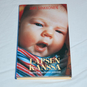 Jari Sinkkonen Lapsen kanssa